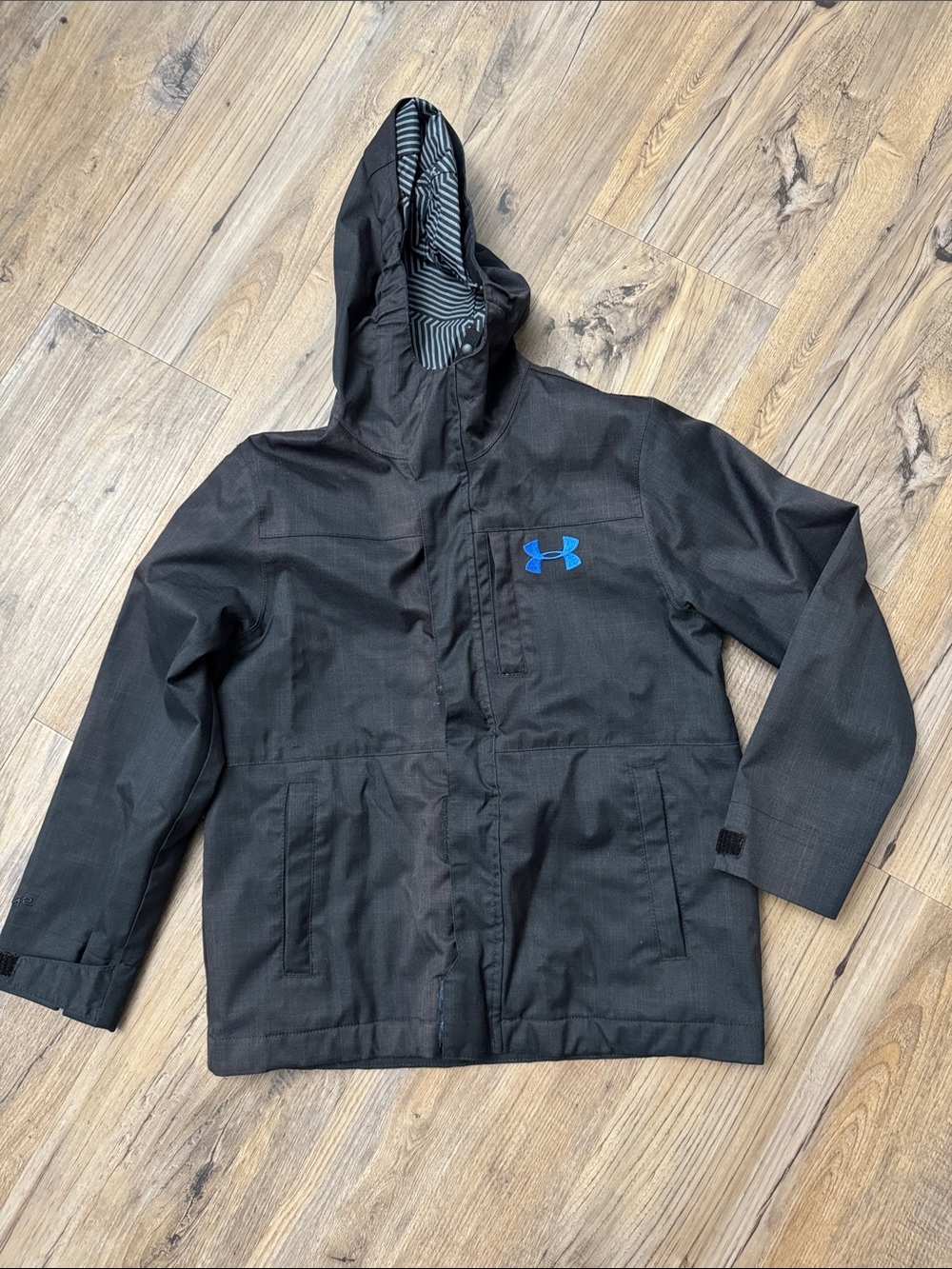 Under Armour Kids Black Hooded Raincoat with Blue Logo